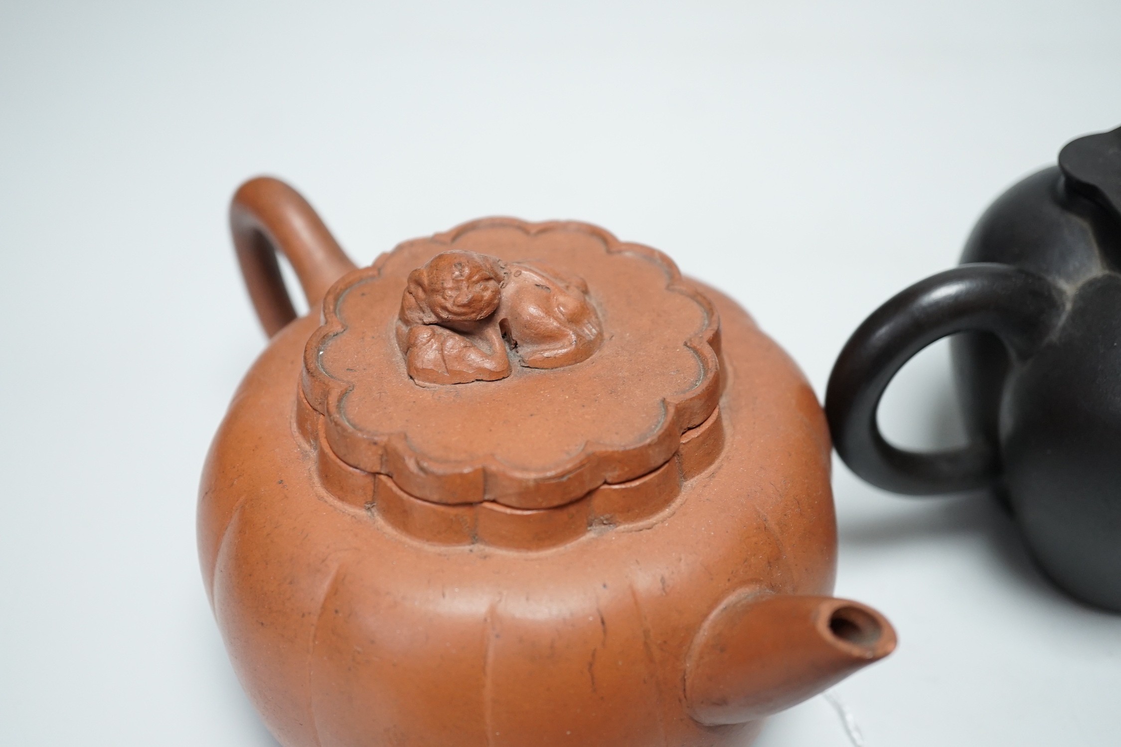 Four Chinese Yixing pottery teapots, tallest 10cm